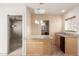 Kitchenette with granite countertop and bar at 15491 W Amelia Dr, Goodyear, AZ 85395