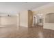 Open living room with tile flooring and high ceilings at 15491 W Amelia Dr, Goodyear, AZ 85395