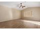 Spacious living room with tile flooring and large window at 15491 W Amelia Dr, Goodyear, AZ 85395