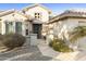 Two-story home with front entrance and landscaping at 15856 W Sage Trl, Surprise, AZ 85374