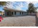 Home's exterior with solar panels and patio at 16796 W Pierce St, Goodyear, AZ 85338