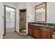 Bathroom with vanity, shower, and closet access at 1777 W Ocotillo Rd # 23, Chandler, AZ 85248