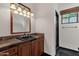 Bathroom with dark vanity and walk-in shower at 1777 W Ocotillo Rd # 23, Chandler, AZ 85248