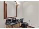 Elegant bathroom with black vanity and fixtures at 1777 W Ocotillo Rd # 23, Chandler, AZ 85248