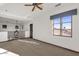 Spacious bedroom with carpeted floor, window seat, and chandelier at 1777 W Ocotillo Rd # 23, Chandler, AZ 85248