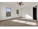 Bright bedroom with water views and ceiling fan at 1777 W Ocotillo Rd # 23, Chandler, AZ 85248
