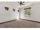 Spacious bedroom with neutral carpeting and large windows at 1777 W Ocotillo Rd # 23, Chandler, AZ 85248