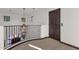 Elegant hallway featuring a chandelier and access to elevator at 1777 W Ocotillo Rd # 23, Chandler, AZ 85248