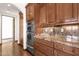 Kitchen with double oven and wood cabinets at 1777 W Ocotillo Rd # 23, Chandler, AZ 85248