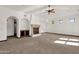 Living room featuring a fireplace and hardwood floors at 1777 W Ocotillo Rd # 23, Chandler, AZ 85248