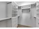 Large walk-in closet with shelving and hanging rods at 1777 W Ocotillo Rd # 23, Chandler, AZ 85248