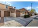Charming home exterior featuring a well-maintained yard and an attached two-car garage at 1921 E Lantana Dr, Chandler, AZ 85286