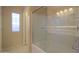 Bathroom features a shower/tub combo and a window for natural light at 19572 N Sandalwood Dr, Maricopa, AZ 85138