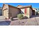 House exterior with two-car garage and red shutters at 19572 N Sandalwood Dr, Maricopa, AZ 85138
