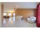 Spacious living room with tile floors and neutral color walls at 19572 N Sandalwood Dr, Maricopa, AZ 85138