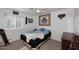 Bright bedroom with a double bed and decorative wall art at 20031 N 22Nd Pl, Phoenix, AZ 85024