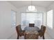 Bright dining room featuring modern windows and a decorative chandelier at 20031 N 22Nd Pl, Phoenix, AZ 85024