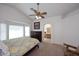 Main bedroom featuring a large window, carpet floors and an ensuite bathroom at 20031 N 22Nd Pl, Phoenix, AZ 85024