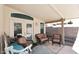 Covered patio with wicker furniture and flagstone flooring at 20031 N 22Nd Pl, Phoenix, AZ 85024