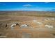 Aerial view showcasing new construction homes in a developing neighborhood at 23197 W Skinner Rd, Wittmann, AZ 85361