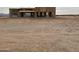 New home construction in progress, showcasing the frame of a house at 23197 W Skinner Rd, Wittmann, AZ 85361