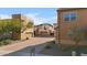 View of the home's driveway and surrounding neighborhood at 2357 W Gloria Ln, Phoenix, AZ 85085