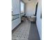 Inviting balcony featuring stylish furniture and decorative tiled flooring, perfect for relaxation and outdoor enjoyment at 2511 W Queen Creek Rd # 377, Chandler, AZ 85248
