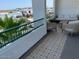 Charming balcony with comfortable seating offers picturesque views of the surrounding neighborhood and lush greenery at 2511 W Queen Creek Rd # 377, Chandler, AZ 85248