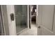 Elegant bathroom with a glass shower and marble tile flooring at 2511 W Queen Creek Rd # 377, Chandler, AZ 85248