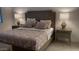 Bright bedroom with a king-size bed and neutral-toned bedding at 2511 W Queen Creek Rd # 377, Chandler, AZ 85248