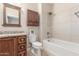 Well-appointed bathroom with tub, shower, and granite vanity at 2562 N 169Th Ave, Goodyear, AZ 85395