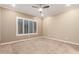 Bright bedroom with window shutters and neutral decor at 2562 N 169Th Ave, Goodyear, AZ 85395