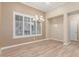 Bright dining room with large window and elegant chandelier at 2562 N 169Th Ave, Goodyear, AZ 85395