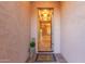 Inviting entryway with light wood flooring and neutral walls at 2562 N 169Th Ave, Goodyear, AZ 85395