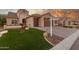 Inviting home exterior with a two-car garage and attractive landscaping at 2562 N 169Th Ave, Goodyear, AZ 85395