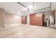 Garage with overhead storage and ample space for vehicles at 2562 N 169Th Ave, Goodyear, AZ 85395