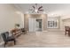 Relaxing living room featuring tile floors and sliding glass doors at 2562 N 169Th Ave, Goodyear, AZ 85395