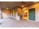 Covered patio with built-in grill and access to interior at 2562 N 169Th Ave, Goodyear, AZ 85395