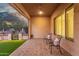 Covered patio with seating area and view of backyard at 2562 N 169Th Ave, Goodyear, AZ 85395