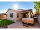 Backyard oasis with covered patio and hot tub at 25823 N 122Nd Ln, Peoria, AZ 85383