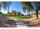 Landscaped community with walking path and benches at 25823 N 122Nd Ln, Peoria, AZ 85383