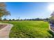 Large grassy area, perfect for recreation, in a community setting at 25823 N 122Nd Ln, Peoria, AZ 85383