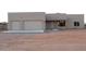 Newly constructed home with a two-car garage at 29380 N 231St Ave, Wittmann, AZ 85361