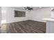 Dining area with hardwood floors and access to kitchen at 3250 W Mercer N Ln, Phoenix, AZ 85029