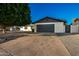 Attached garage with ample parking space at 3250 W Mercer N Ln, Phoenix, AZ 85029