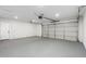 Spacious garage with automatic door opener and ample storage space at 3250 W Mercer N Ln, Phoenix, AZ 85029