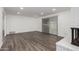 Spacious living room featuring wood-look floors and lots of natural light at 3250 W Mercer N Ln, Phoenix, AZ 85029