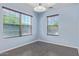 Bright dining area with tile flooring and large windows at 36532 W Barcelona Ln, Maricopa, AZ 85138