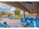 Covered patio with seating area and views of the backyard at 3730 E Kingbird Pl, Chandler, AZ 85286