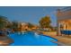 Relaxing pool and spa area with a rock waterfall feature at 3730 E Kingbird Pl, Chandler, AZ 85286